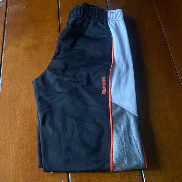 Reebok tricot pants size S (8) boys. Black white and orange/grey. - Picture 1 of 16